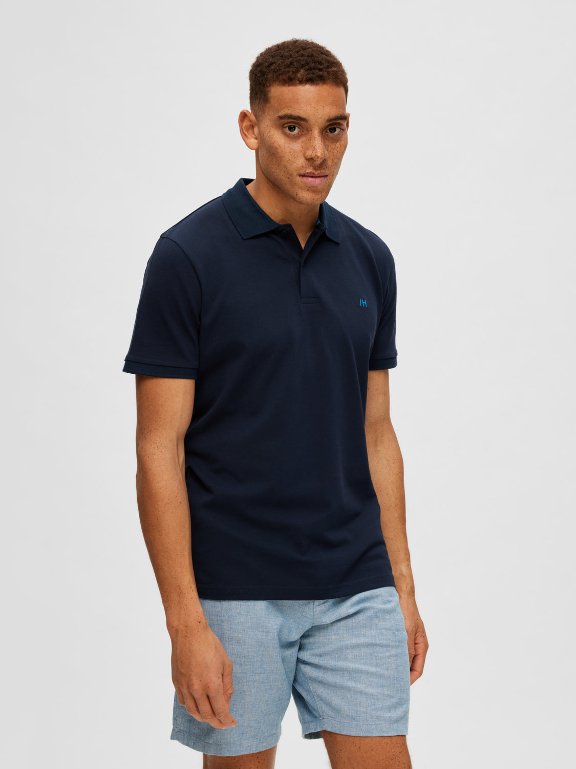 Navy blue polo shirt and khaki pants outlet
